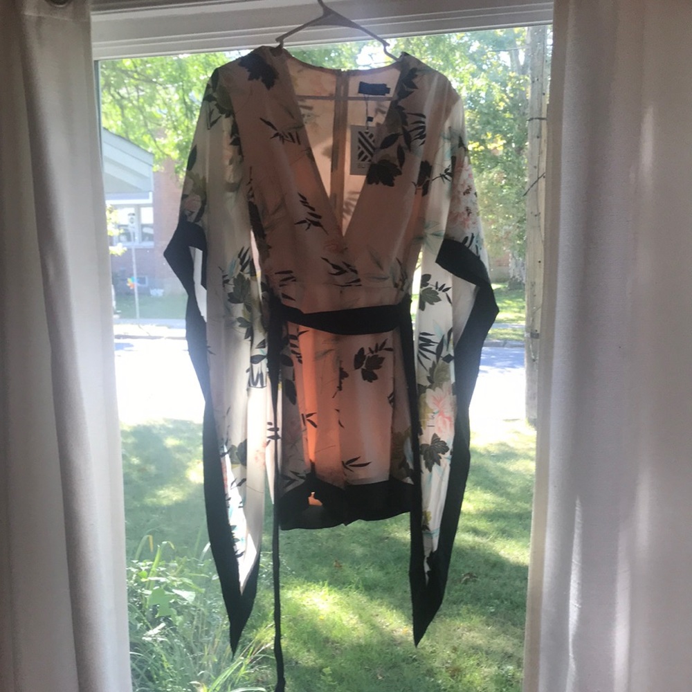 Kimono style romper tags still on